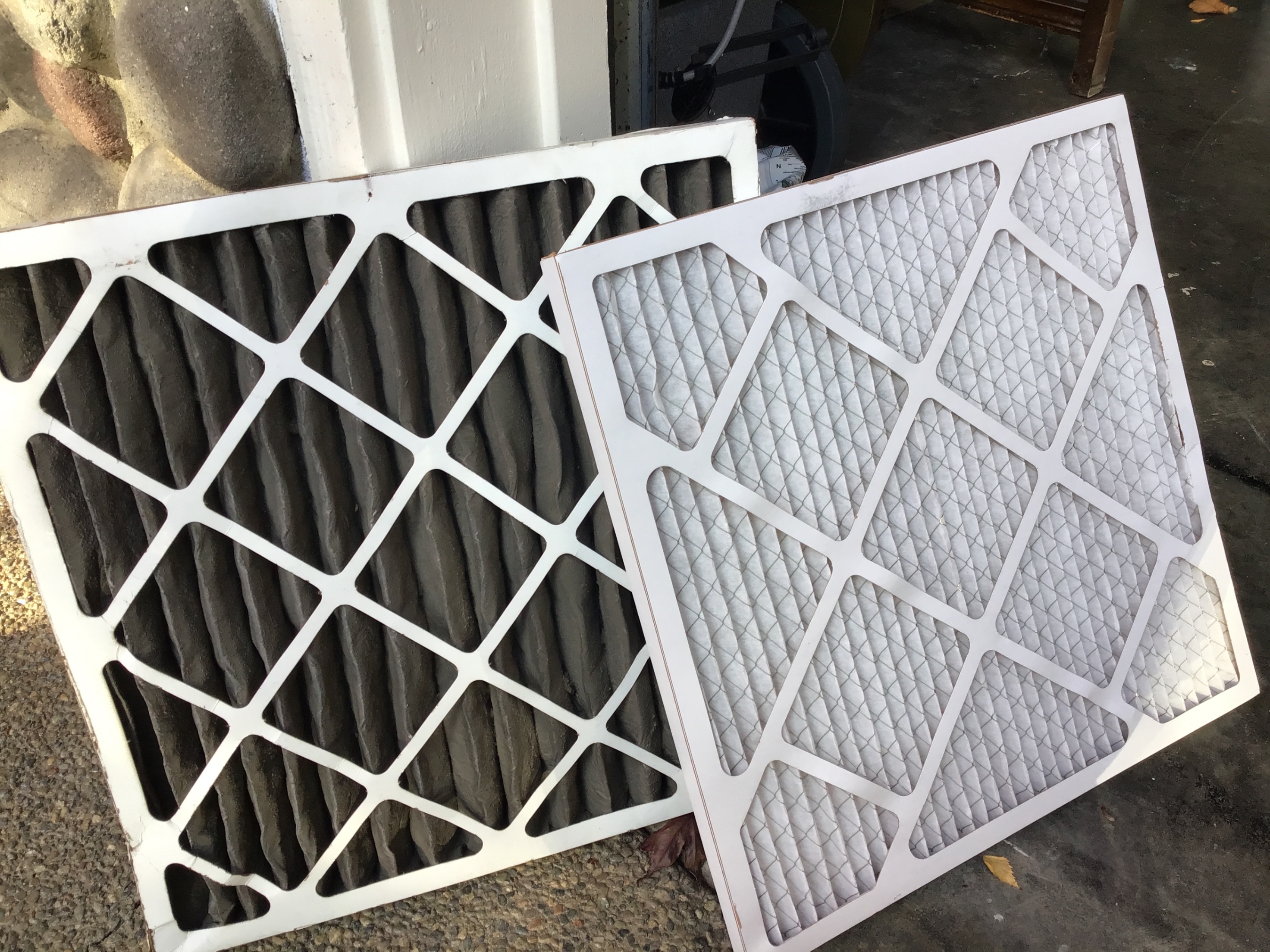 Clean vs dirty HVAC air filter comparison